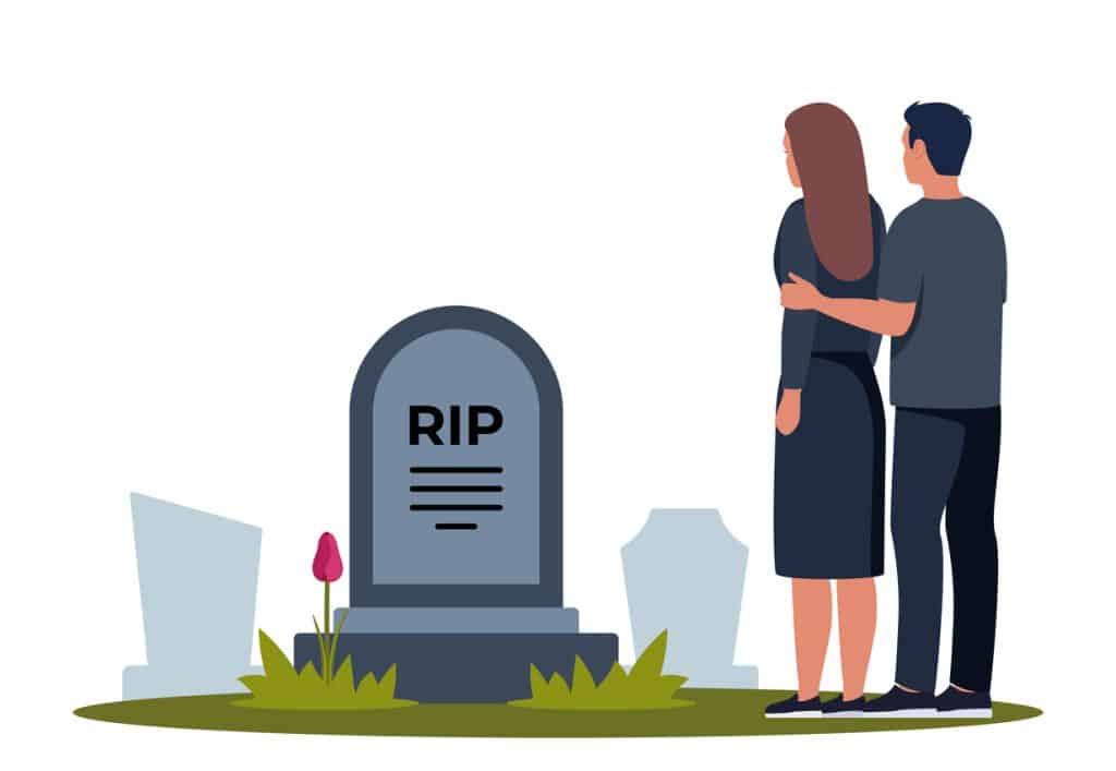 A couple visiting the tombstone of a loved one who was a victim of a North Carolina wrongful death. 